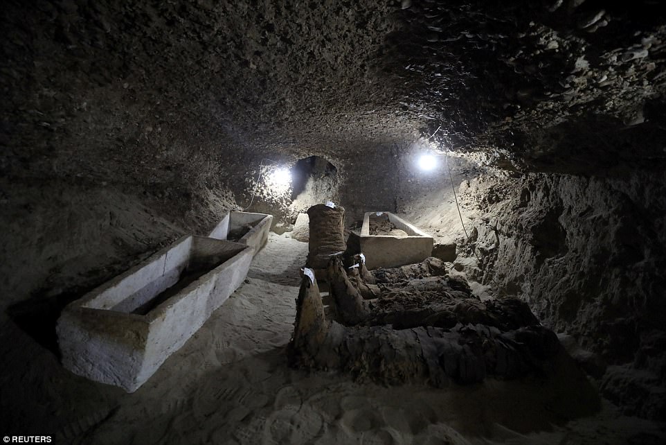 Several mummies lying in one of the burial site's many passageways.