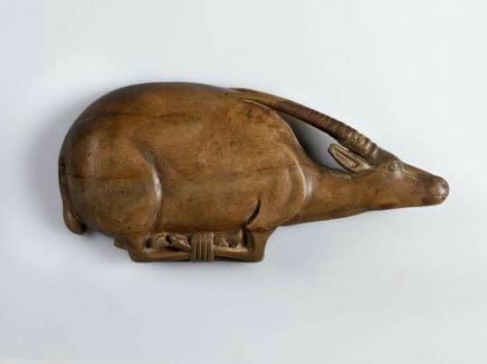 Wooden dish depicting a bound oryx.  1390 - 1352 BC