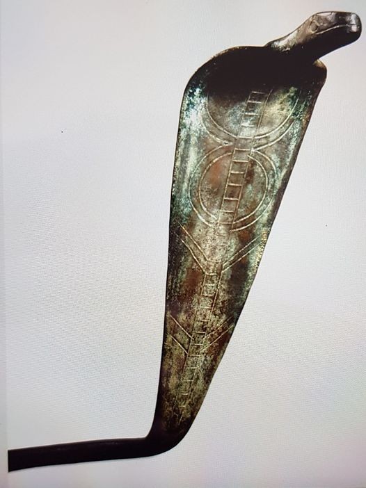 Bronze object in the form of an uraeus with long undulating tail part of a magician s equipment 