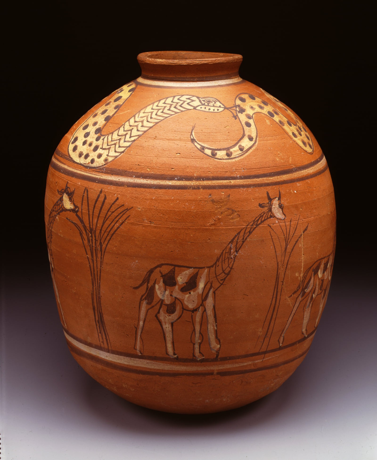 Ceramic painted meroitic jar 100 bc 1bc 34 cm in height from karanog cemetery locus g 566 decorated with a frieze of giraffes and snakes spitting ankh signs