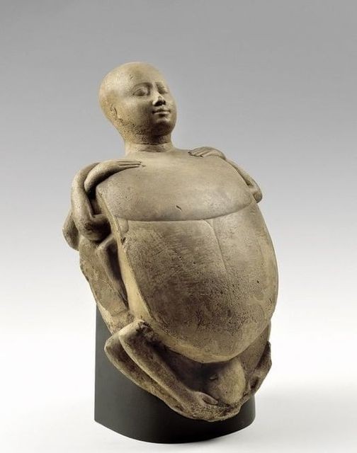 Two hugging scarabs with human heads late period to early ptolemaic period 4th century bc 