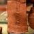 Copper or bronze sheet bearing the name of hatshepsut from a foundation deposit in a small pit covered with a mat found at deir el bahri egypt 18th dynasty the petrie museum of egy