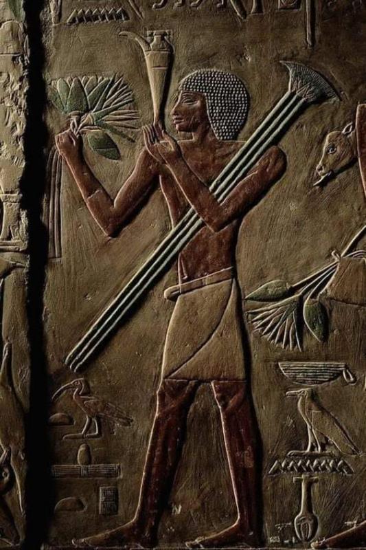 Lotus bouquet and a purification vessel detail of a wall carving from the mastaba of ptahhotep and akhethotep old kingdom 5th dynasty ca 2494 2345 bce