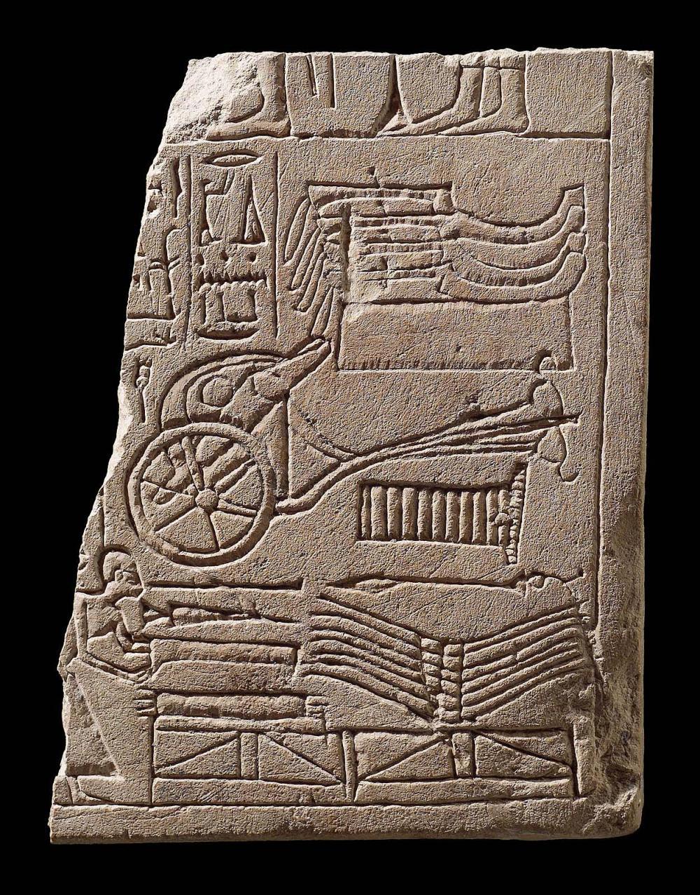 Relief depicting weapons