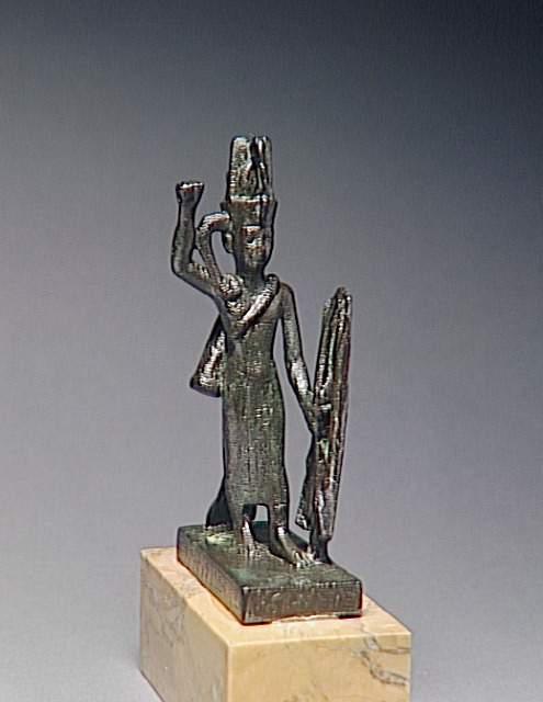 Statuette du dieu guerrier reshep tenant arc fleches et bouclier