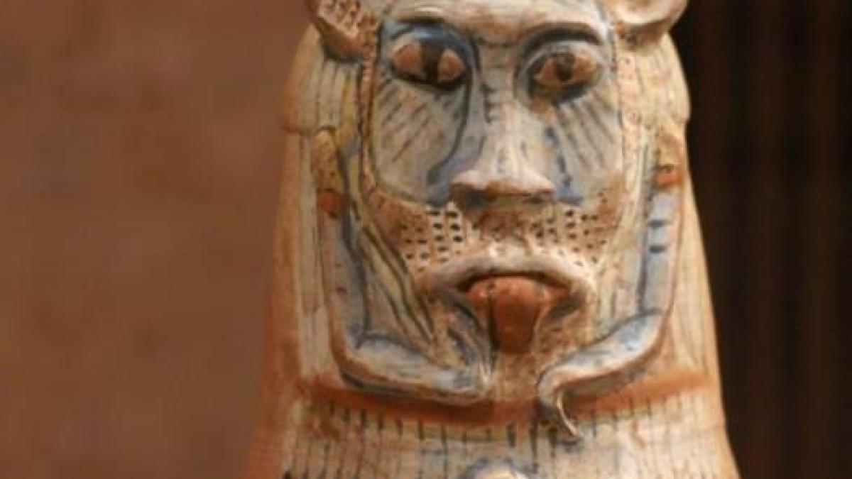 This wine jar represents bes the protection god of women children but also the god of music dance and wine